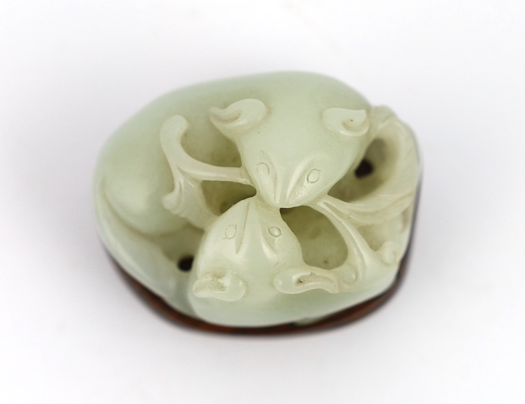 A Chinese pale celadon jade group of two badgers, 18th/19th century